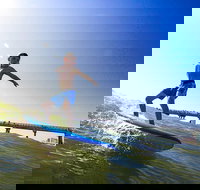 Learn to Surf with a Group Surfing Lesson and Professional Instructor - Accommodation Texas